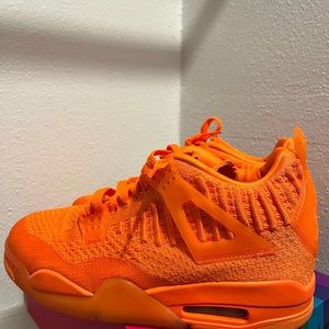 Air Jordan 4s flyknit  “total orange”
